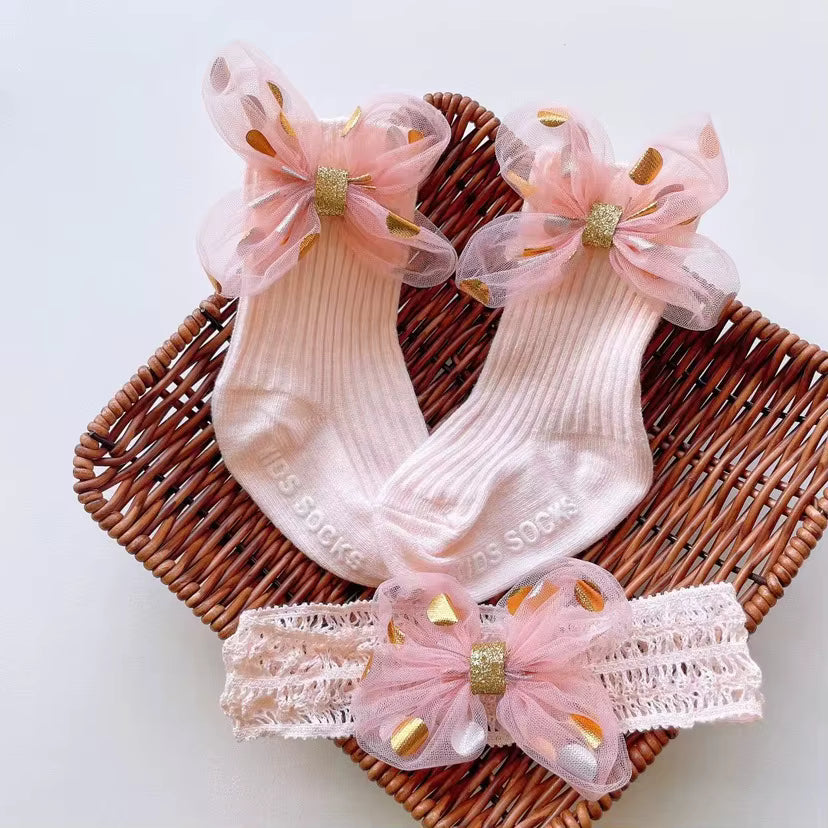 .גרבי תינוקת מתוקות עם פפיון ענק עם סרט ראש תואם